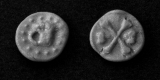 obverse and reverse of a dwarven silver coin